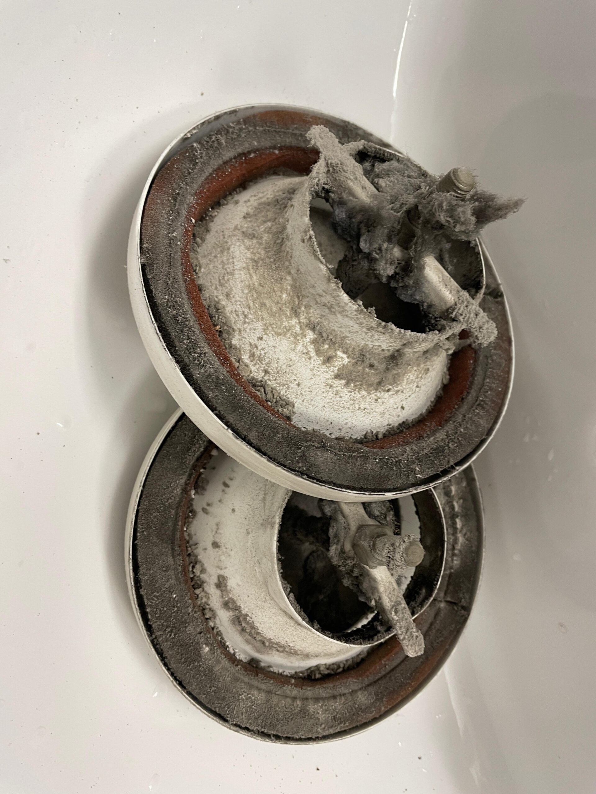 Verschmutzte alte Tellerventile Rückseite